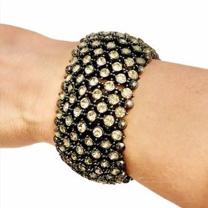 Crystal Sparkling Clear Stretch rhinestones set in a dark gunmetal-tone setting.